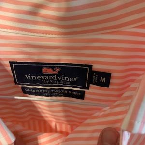 Pink Vineyard Vines shirt.